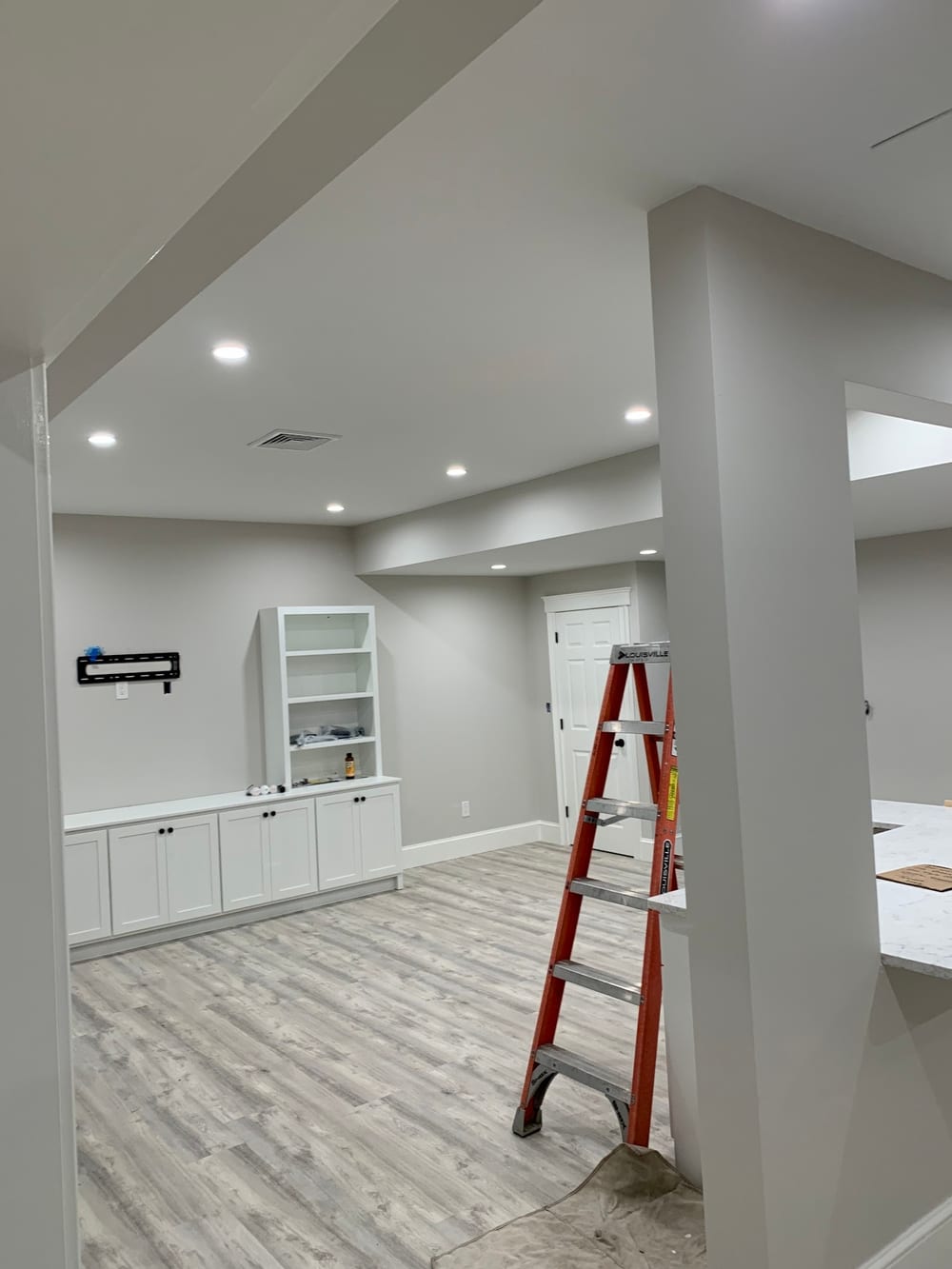 Finished basement remodel with recessed lighting by Giorgio Electric